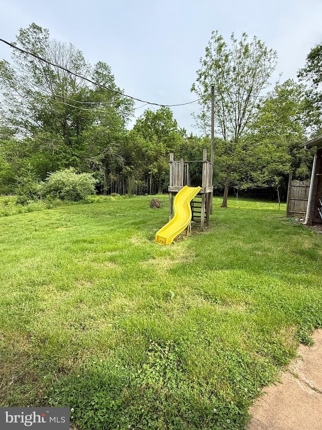 7421 Lake Dr, Manassas, VA 20111 - view of green lawn with a playground