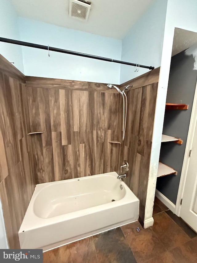 7421 Lake Dr, Manassas, VA 20111 - full bath with shower / tub combination and tile patterned flooring