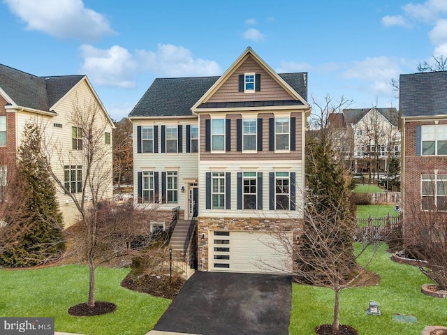 42743 Macauley Pl, Ashburn, VA 20148 - view of front facade with asphalt driveway, stone siding, an attached garage, and stairway