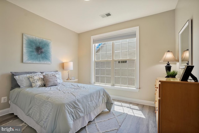 42743 Macauley Pl, Ashburn, VA 20148 - bedroom featuring wood finished floors and baseboards