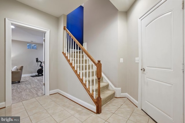 42743 Macauley Pl, Ashburn, VA 20148 - stairs featuring tile patterned flooring and baseboards