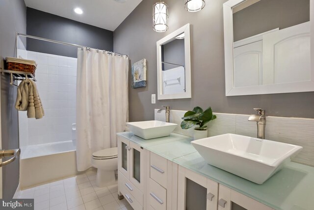 42743 Macauley Pl, Ashburn, VA 20148 - full bath with toilet, tile patterned floors, shower / bath combination with curtain, double vanity, and recessed lighting