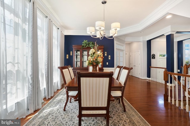 42743 Macauley Pl, Ashburn, VA 20148 - dining space with crown molding, a chandelier, wood finished floors, and recessed lighting