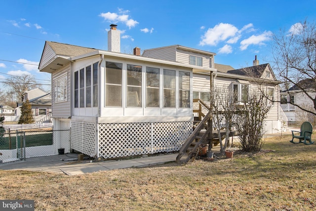 102 S Poplar Ave, Maple Shade, NJ 08052 - rear view of house featuring a sunroom, a chimney, and stairs