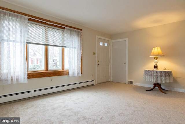 102 S Poplar Ave, Maple Shade, NJ 08052 - foyer entrance with baseboard heating, carpet floors, and baseboards