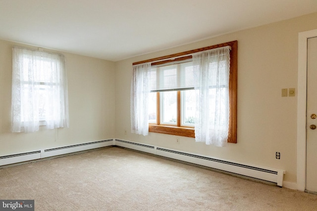 102 S Poplar Ave, Maple Shade, NJ 08052 - carpeted empty room featuring healthy amount of natural light and a baseboard heating unit