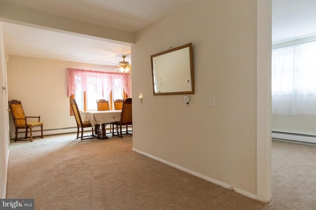 102 S Poplar Ave, Maple Shade, NJ 08052 - carpeted dining space with ceiling fan, baseboards, and a baseboard heating unit