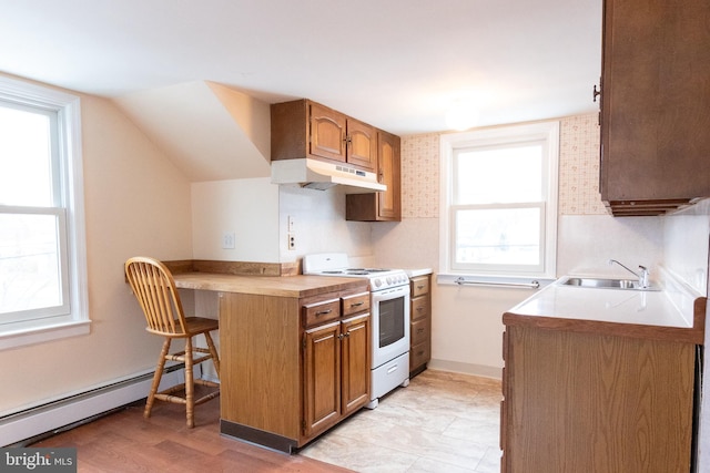 102 S Poplar Ave, Maple Shade, NJ 08052 - kitchen featuring electric stove, baseboard heating, under cabinet range hood, and brown cabinetry