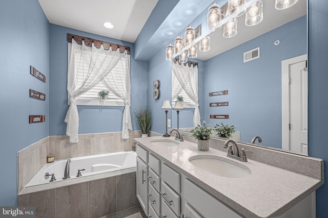 3451 Flatwoods Dr, Frederick, MD 21704 - bathroom featuring a bath and double vanity
