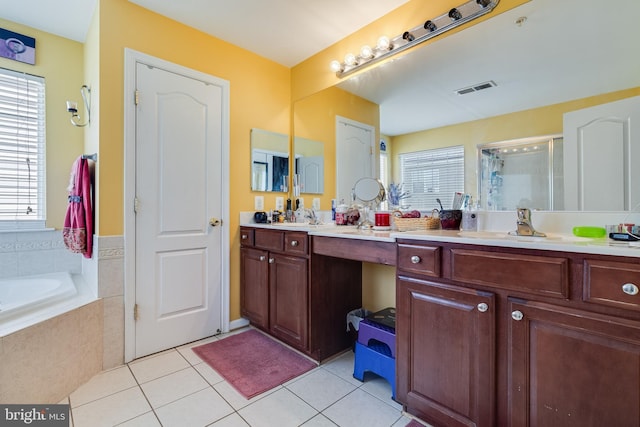 15603 Chadsey Ln, Brandywine, MD 20613 - full bath featuring double vanity, a garden tub, tile patterned flooring, and a stall shower