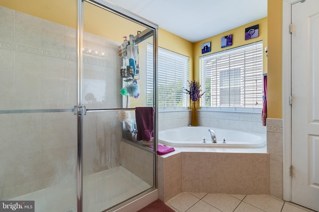 15603 Chadsey Ln, Brandywine, MD 20613 - bathroom featuring a garden tub, a stall shower, and tile patterned floors