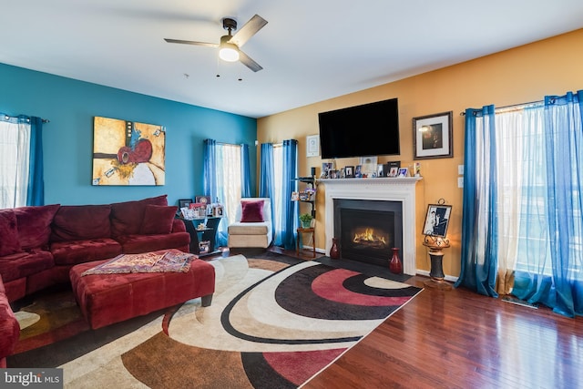 15603 Chadsey Ln, Brandywine, MD 20613 - living room with a ceiling fan, a fireplace with flush hearth, and wood finished floors