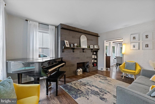 272 Main St, Hamilton, NJ 08620 - living room with a fireplace and wood finished floors