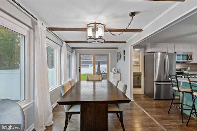 272 Main St, Hamilton, NJ 08620 - dining space featuring a chandelier, plenty of natural light, dark wood-style floors, ornamental molding, and french doors