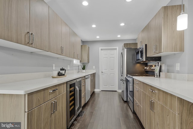 402 Bay View Dr, Edgewater, MD 21037 - kitchen with appliances with stainless steel finishes, beverage cooler, modern cabinets, a sink, and dark wood-style flooring