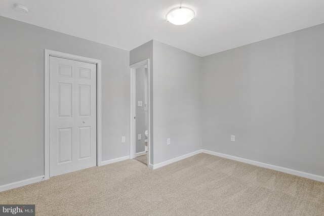 402 Bay View Dr, Edgewater, MD 21037 - unfurnished bedroom with carpet and baseboards