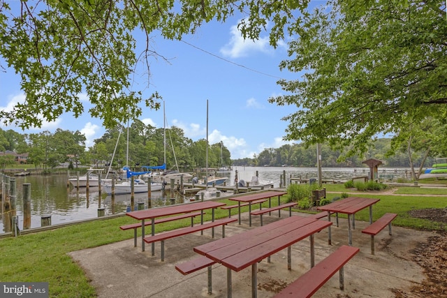 402 Bay View Dr, Edgewater, MD 21037 - view of property's community featuring a boat dock, a water view, and a lawn