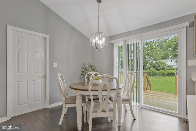 402 Bay View Dr, Edgewater, MD 21037 - dining room featuring a chandelier, lofted ceiling, dark wood-style flooring, and baseboards