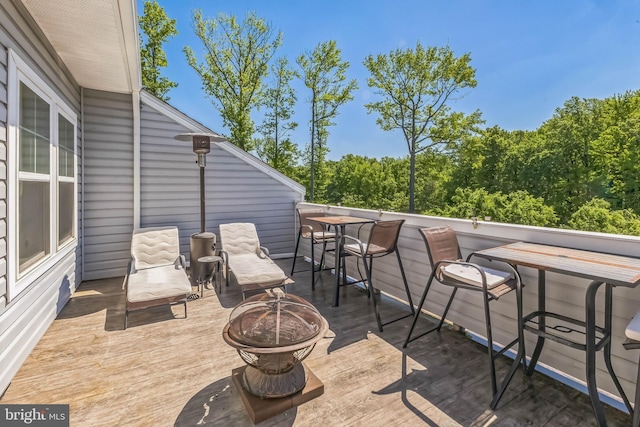 7109 Yamhill Way, Glen Burnie, MD 21060 - wooden deck featuring an outdoor fire pit