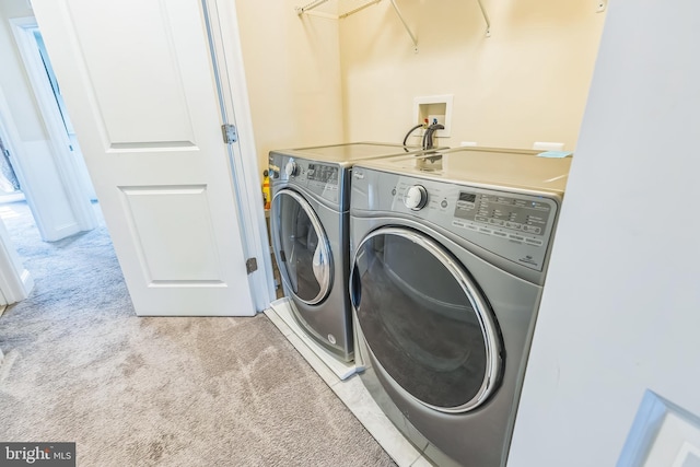 7109 Yamhill Way, Glen Burnie, MD 21060 - washroom featuring washing machine and clothes dryer and light carpet