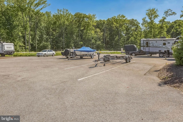 7109 Yamhill Way, Glen Burnie, MD 21060 - uncovered parking lot with a forest view