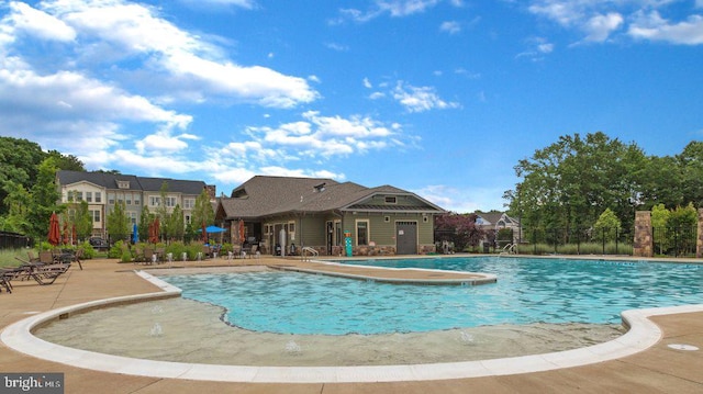 7109 Yamhill Way, Glen Burnie, MD 21060 - community pool featuring a patio area