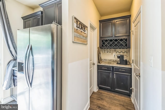 7109 Yamhill Way, Glen Burnie, MD 21060 - indoor wet bar with stainless steel fridge and dark wood-type flooring