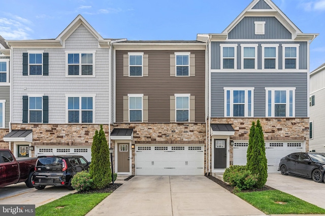 120 Bayhill Ter, Lake Frederick, VA 22630 - view of property with stone siding, a garage, driveway, and board and batten siding