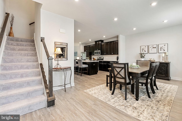 120 Bayhill Ter, Lake Frederick, VA 22630 - dining space with light wood-type flooring, stairs, baseboards, and recessed lighting