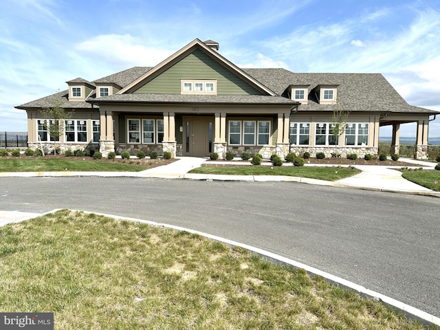 120 Bayhill Ter, Lake Frederick, VA 22630 - view of front of house with stone siding, roof with shingles, and a front lawn