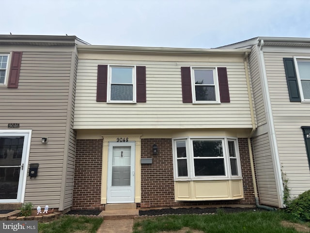 9048 Bonham Cir, Manassas, VA 20110 - view of property featuring brick siding
