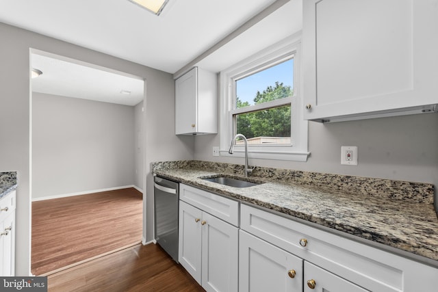 9048 Bonham Cir, Manassas, VA 20110 - kitchen with a sink, stainless steel dishwasher, dark wood-style floors, light stone countertops, and baseboards