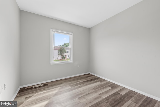 9048 Bonham Cir, Manassas, VA 20110 - spare room with wood finished floors and baseboards