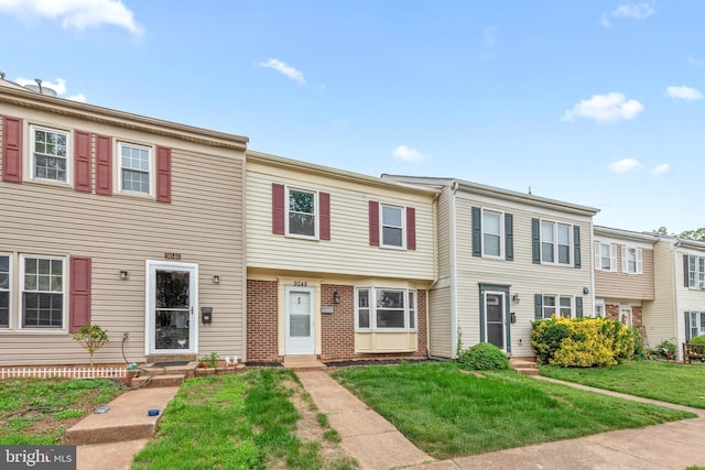 9048 Bonham Cir, Manassas, VA 20110 - view of property featuring entry steps and a front lawn