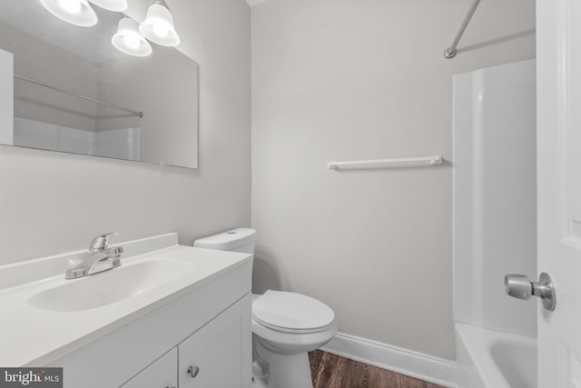 9048 Bonham Cir, Manassas, VA 20110 - full bathroom featuring wood finished floors, toilet, baseboards, vanity, and bathing tub / shower combination