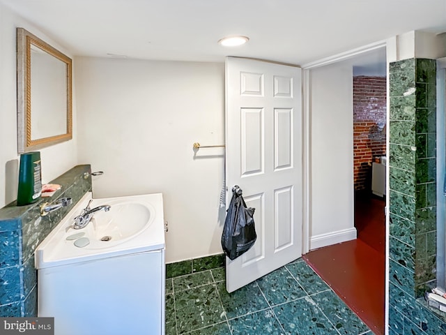1232 W Pratt St, Baltimore, MD 21223 - bathroom featuring vanity and baseboards