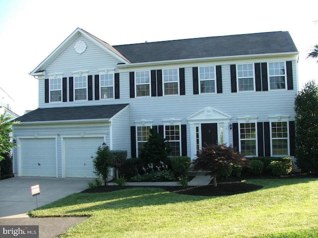 7 Otto Way, Fredericksburg, VA 22406 - colonial-style house with an attached garage, concrete driveway, and a front lawn