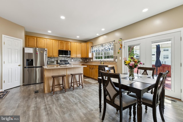 7 Otto Way, Fredericksburg, VA 22406 - dining space with light wood finished floors, recessed lighting, and french doors