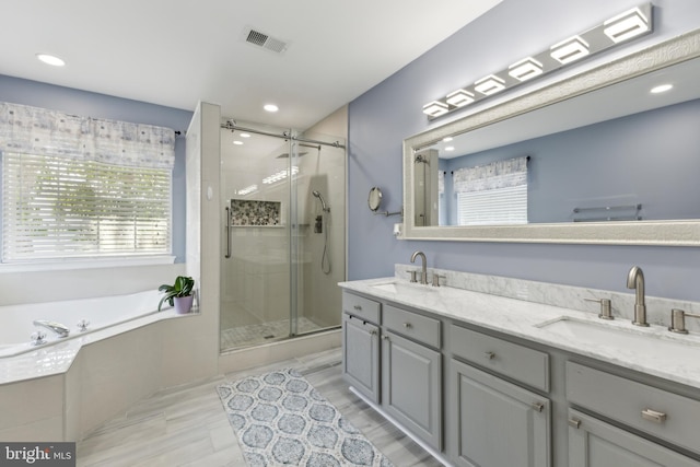 7 Otto Way, Fredericksburg, VA 22406 - full bath with double vanity, a stall shower, a garden tub, and recessed lighting