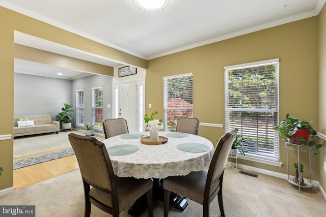 7 Otto Way, Fredericksburg, VA 22406 - carpeted dining space with ornamental molding, baseboards, and plenty of natural light