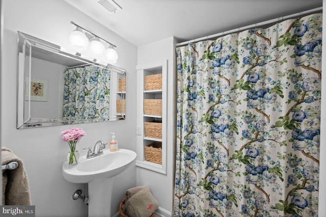 922 Montgomery Ave Unit E2, Bryn Mawr, PA 19010 - bathroom featuring a shower with shower curtain