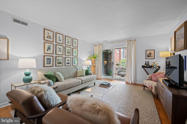 922 Montgomery Ave Unit E2, Bryn Mawr, PA 19010 - living room with wood finished floors and baseboards