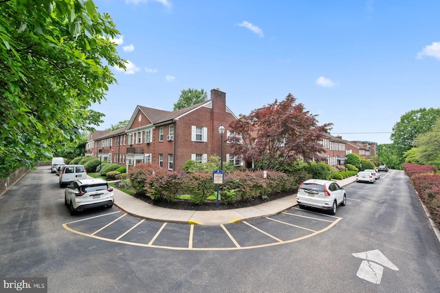 922 Montgomery Ave Unit E2, Bryn Mawr, PA 19010 - view of asphalt street with curbs, sidewalks, and street lights