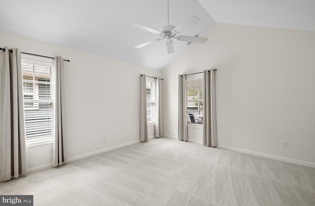 36518 Harmon Bay Blvd Unit 27, Rehoboth Beach, DE 19971 - unfurnished bedroom with vaulted ceiling, carpet flooring, baseboards, and a ceiling fan