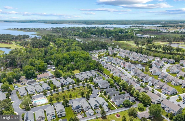 36518 Harmon Bay Blvd Unit 27, Rehoboth Beach, DE 19971 - aerial view of property and surrounding area with nearby suburban area and a large body of water