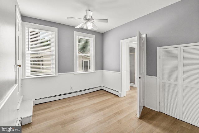 201 E Main St, Fairfield, PA 17320 - unfurnished dining area with ceiling fan, light wood-style flooring, a baseboard heating unit, and wainscoting