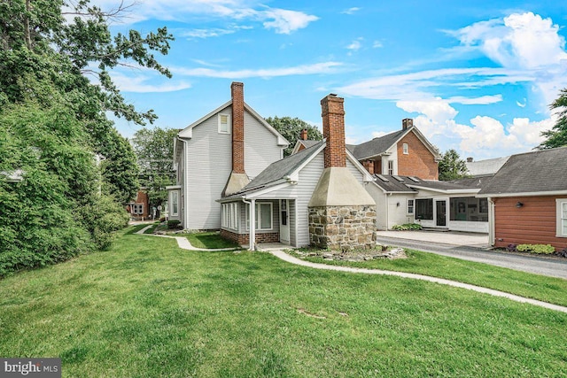 201 E Main St, Fairfield, PA 17320 - view of property exterior with a yard and a chimney