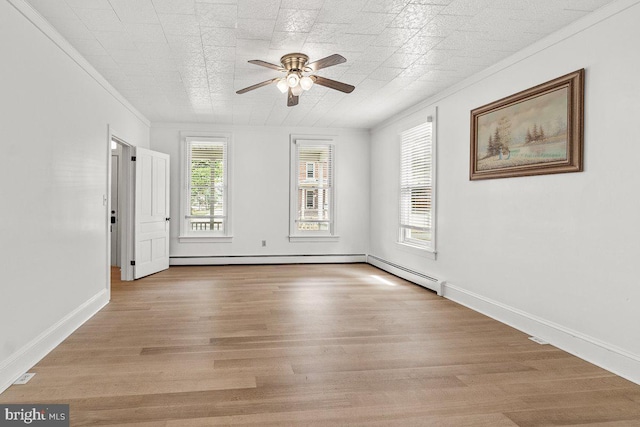 201 E Main St, Fairfield, PA 17320 - unfurnished room featuring ornamental molding, a ceiling fan, wood finished floors, and baseboards
