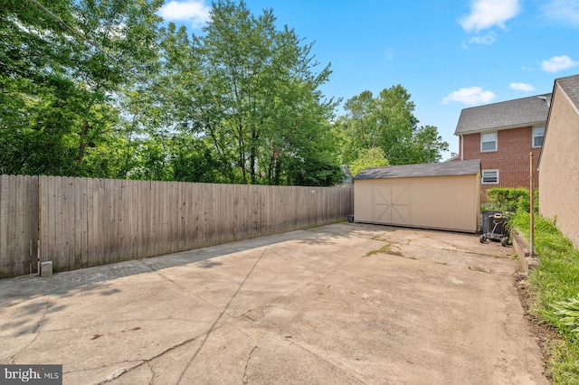 1505 Wynnewood Rd, Ardmore, PA 19003 - fenced backyard featuring a storage shed and a patio area