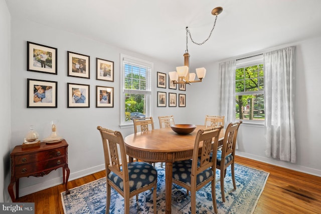 1505 Wynnewood Rd, Ardmore, PA 19003 - dining room featuring a chandelier, plenty of natural light, and wood finished floors
